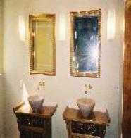 Modern Bathroom with Bowl Sinks and Custom Mirrors